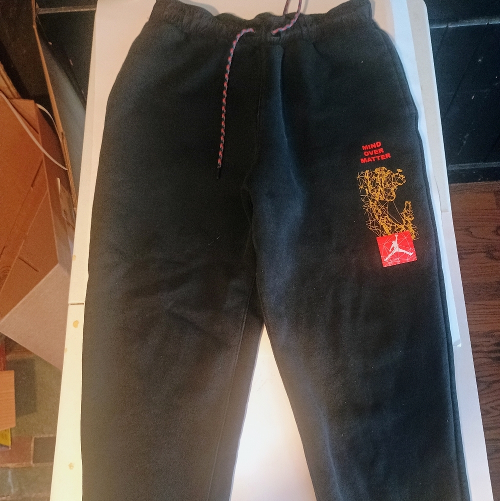 Black Pants with Red and Yellow Graphic